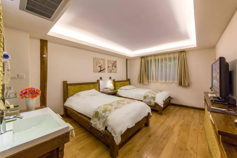 Lijiang Merry Inn Экстерьер фото