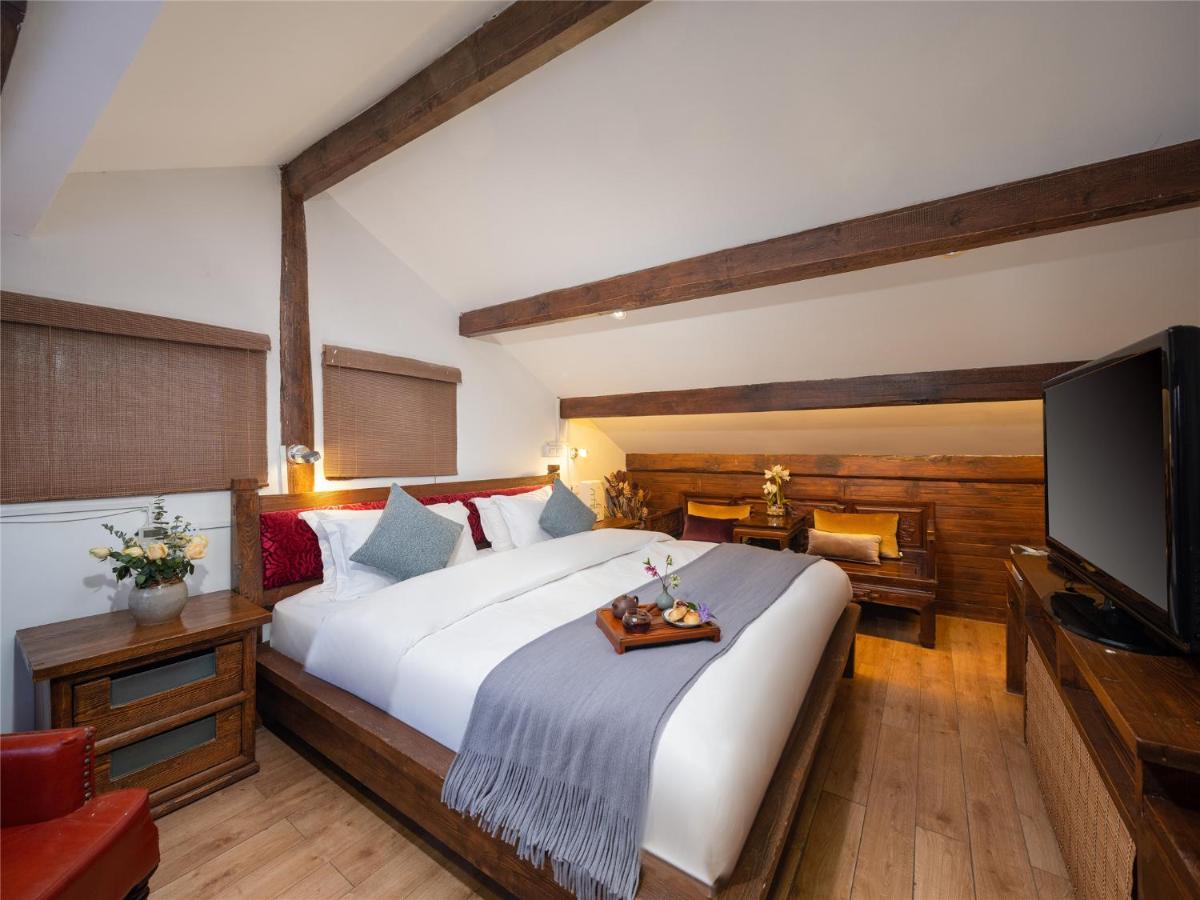 Lijiang Merry Inn Экстерьер фото