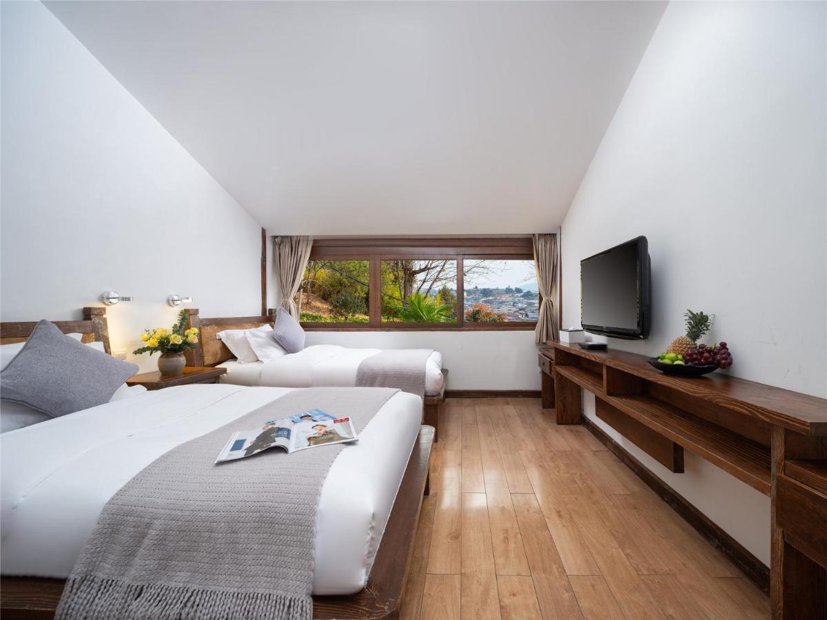 Lijiang Merry Inn Экстерьер фото